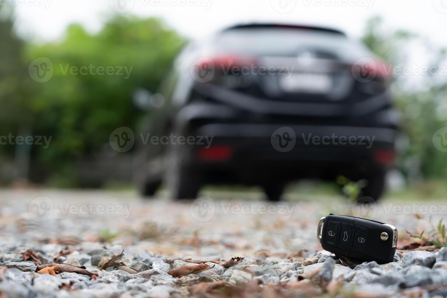 Car keys dropped on the floor or fall lying on the street home front. Walking Away From Lost Car Key, can not transport, express, rush time, wast time, emergency photo