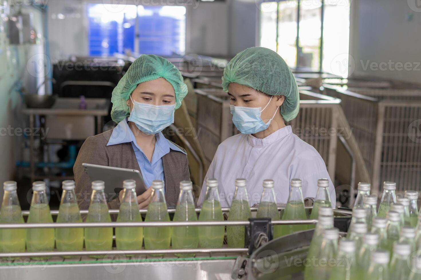 Business owner food or beverages and quality team inspection about quality control food or beverages before send product to the customer. Quality control or assurance, Good standard photo