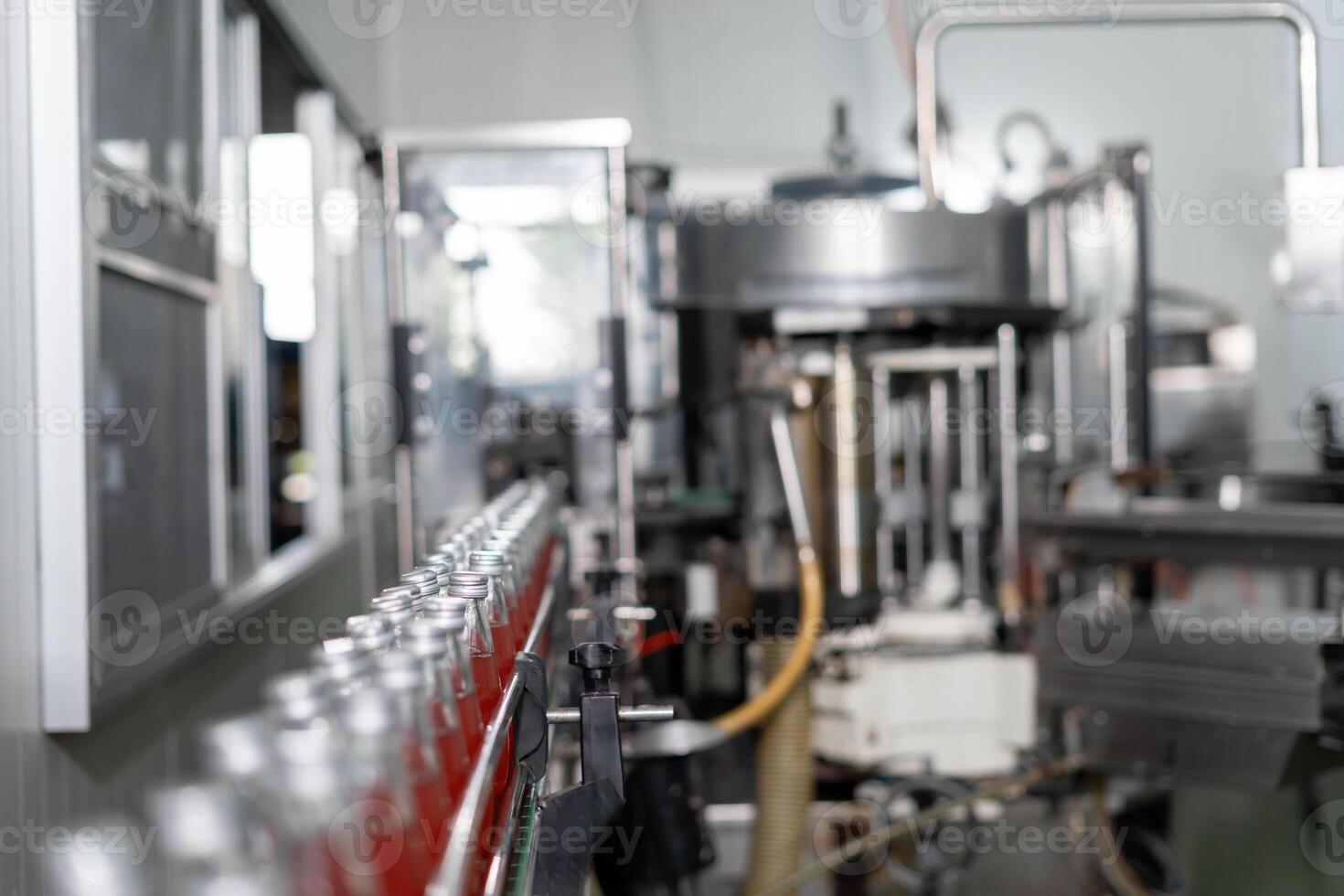 Factory of food or beverages, Conveyor for feed bottle, food or beverages on warehouse before send product to the customer. Quality control or assurance, Good standard photo