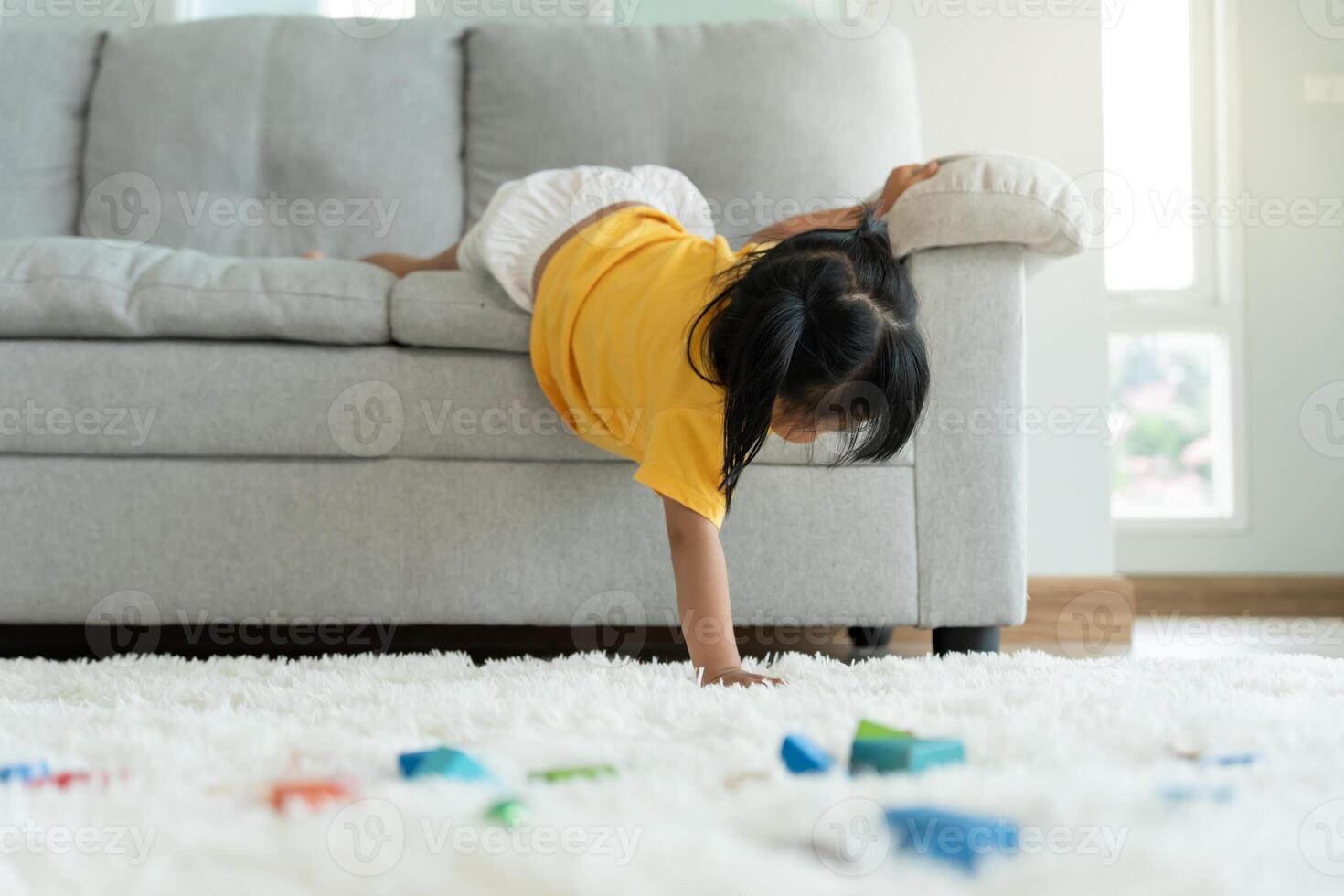 Happy Asia children play and learn funny activity at home. Play stunts. daughter having fun spending time, Activity, development, IQ, EQ, meditation, brain, muscles, essential skills photo