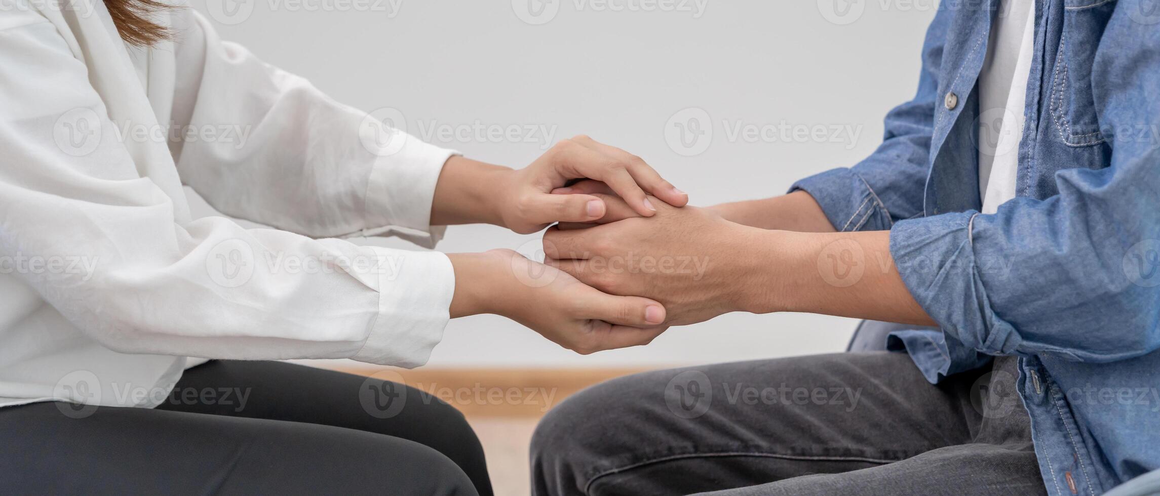 hold hand for support each while discussing family issues. doctor encourages and empathy woman suffers depression. psychological, save divorce, Hand in hand together, trust, care photo