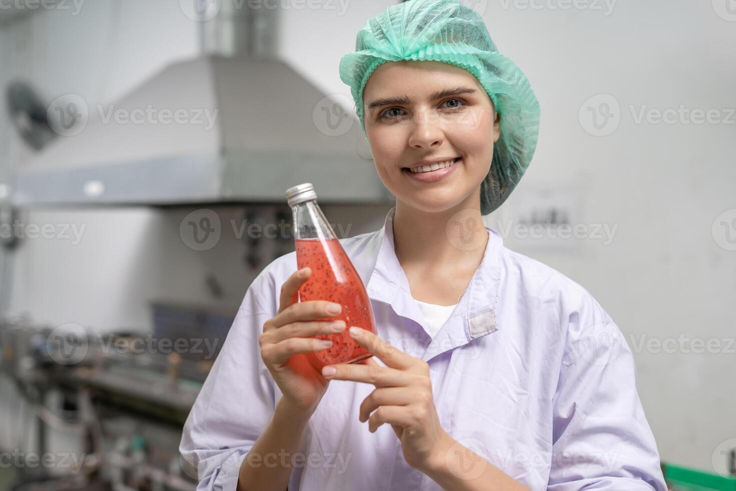 Portrait inspector food or beverages technician inspection about quality control food or beverages before send product to the customer. Production leader recheck ingredient and productivity. photo