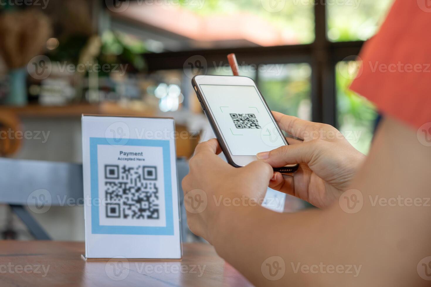 smartphone to scan QR code to pay in cafe restaurant with a digital payment without cash. Choose menu and order accumulate discount. E wallet, technology, pay online, credit card, photo