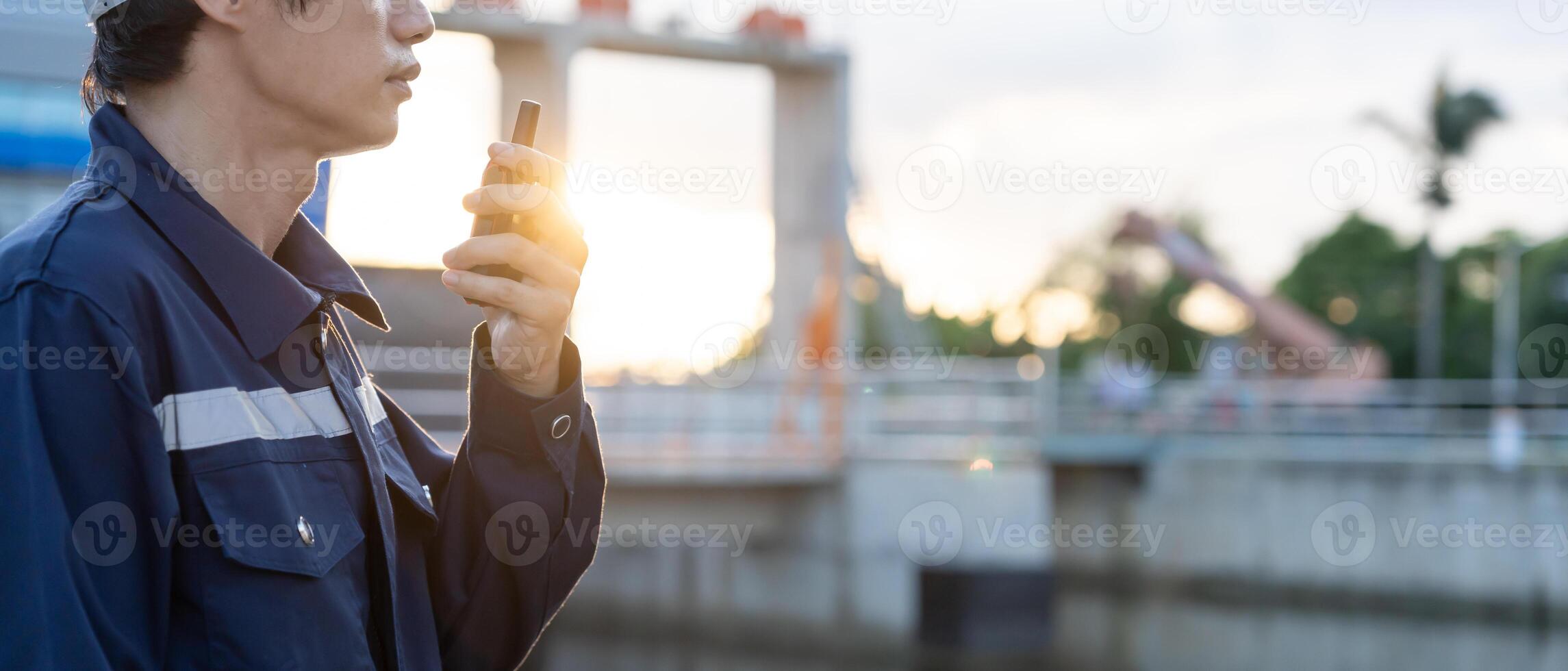 maintenance orinspector, Maintenance engineers are using walky talky to inform the results of inspection of buildings and structures. Irrigation engineers are exploring sluice systems photo