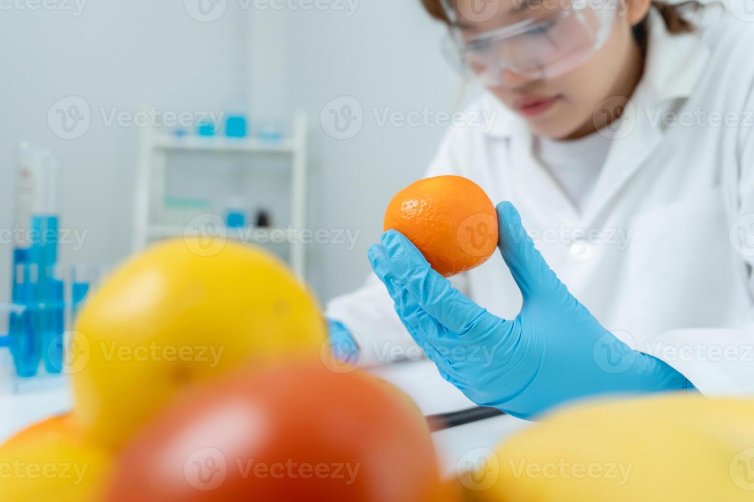 Scientist check chemical food residues in laboratory. Control experts inspect quality of fruit, vegetables. lab, hazards, ROHs, find prohibited substances, contaminate, Microscope, Microbiologist photo