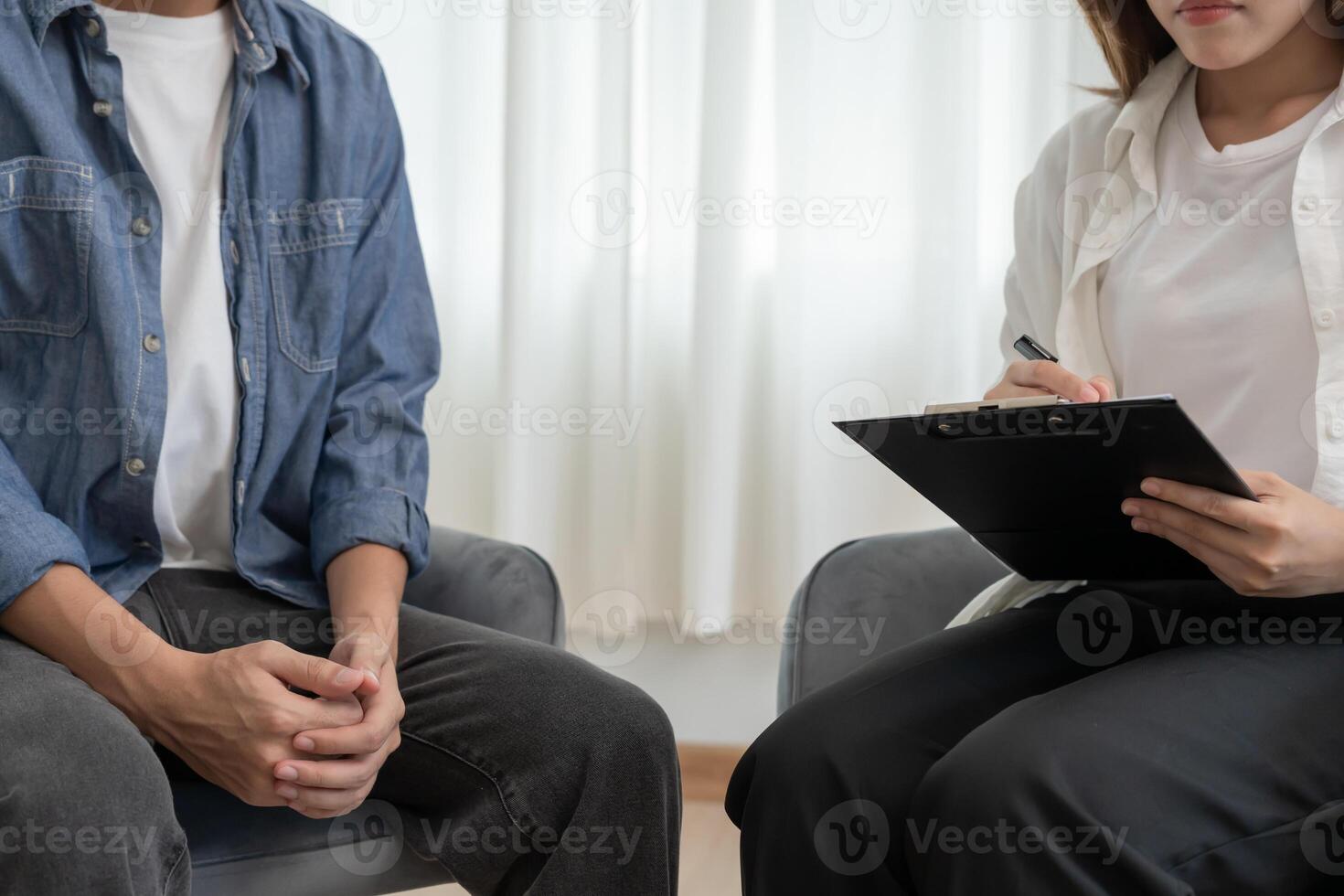 mental health problem is consult. psychiatrist is recording the patient's condition for treatment. encouragement, love and family problem, bipolar , depression patient, protect suicide photo