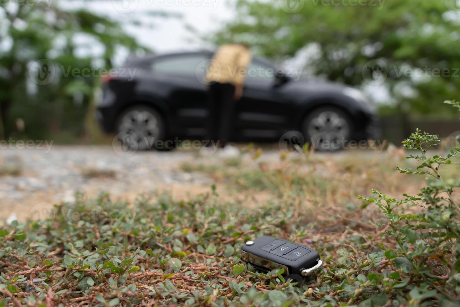 Lost car keys on the ground, Car keys dropped on the floor or fall lying on the street home front. Walking Away From Lost Car Key, can not transport, express, wast time, emergency photo