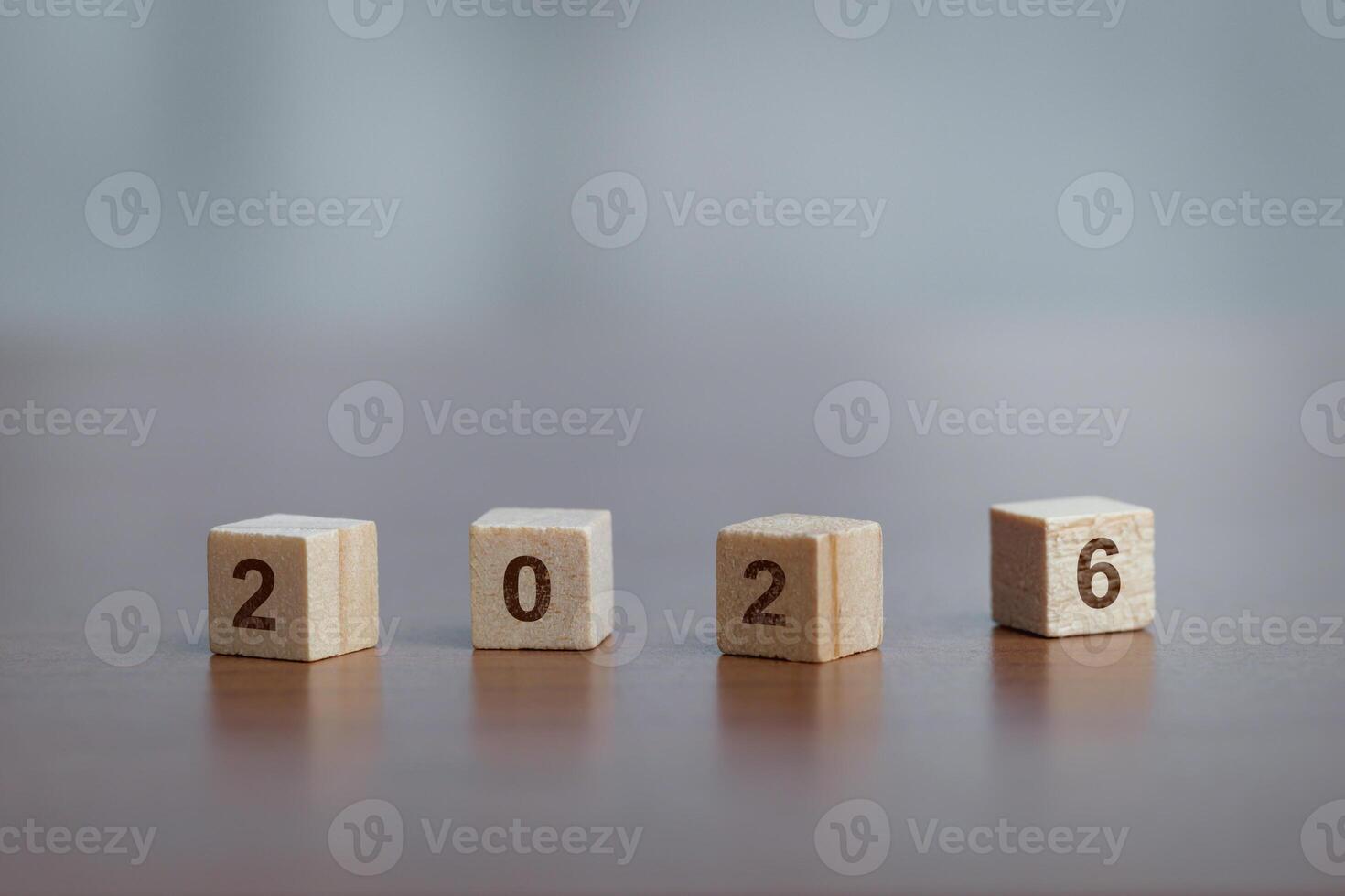 Wooden blocks display the year 2026, symbolizing new beginnings and future aspirations. photo
