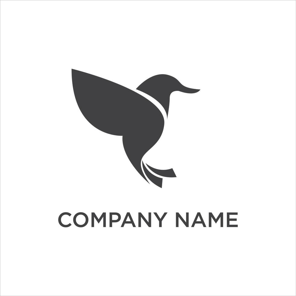 A sleek, dark gray hummingbird logo depicted in a stylized, modern form, conveying grace, speed, or nature. vector