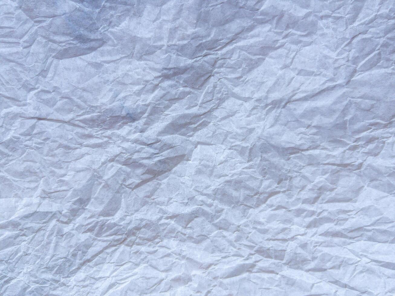 White recycled craft paper texture as background. Grey paper texture, Old vintage page or grunge vignette of old newspaper. photo