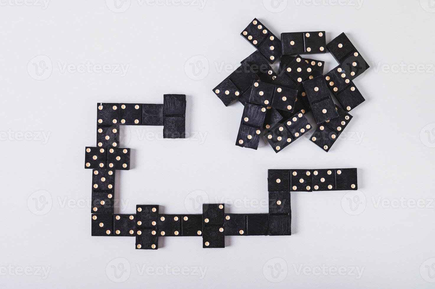 Close up of a calm domino board game for leisure on the table top view photo