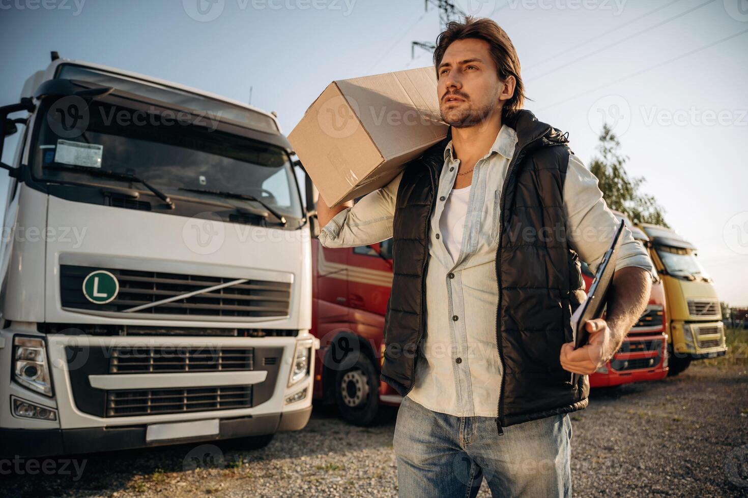 Delivery, is, on the way, with box. Truck ,,driver is near the transport outdoors photo