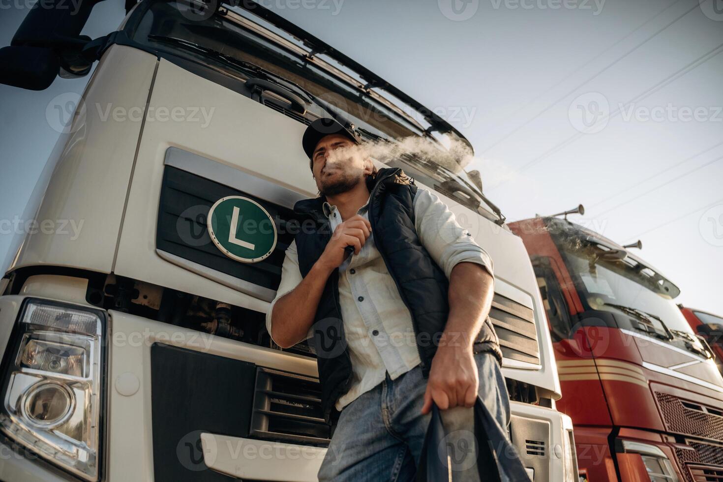 Truck, driver,, is near the transport outdoors photo