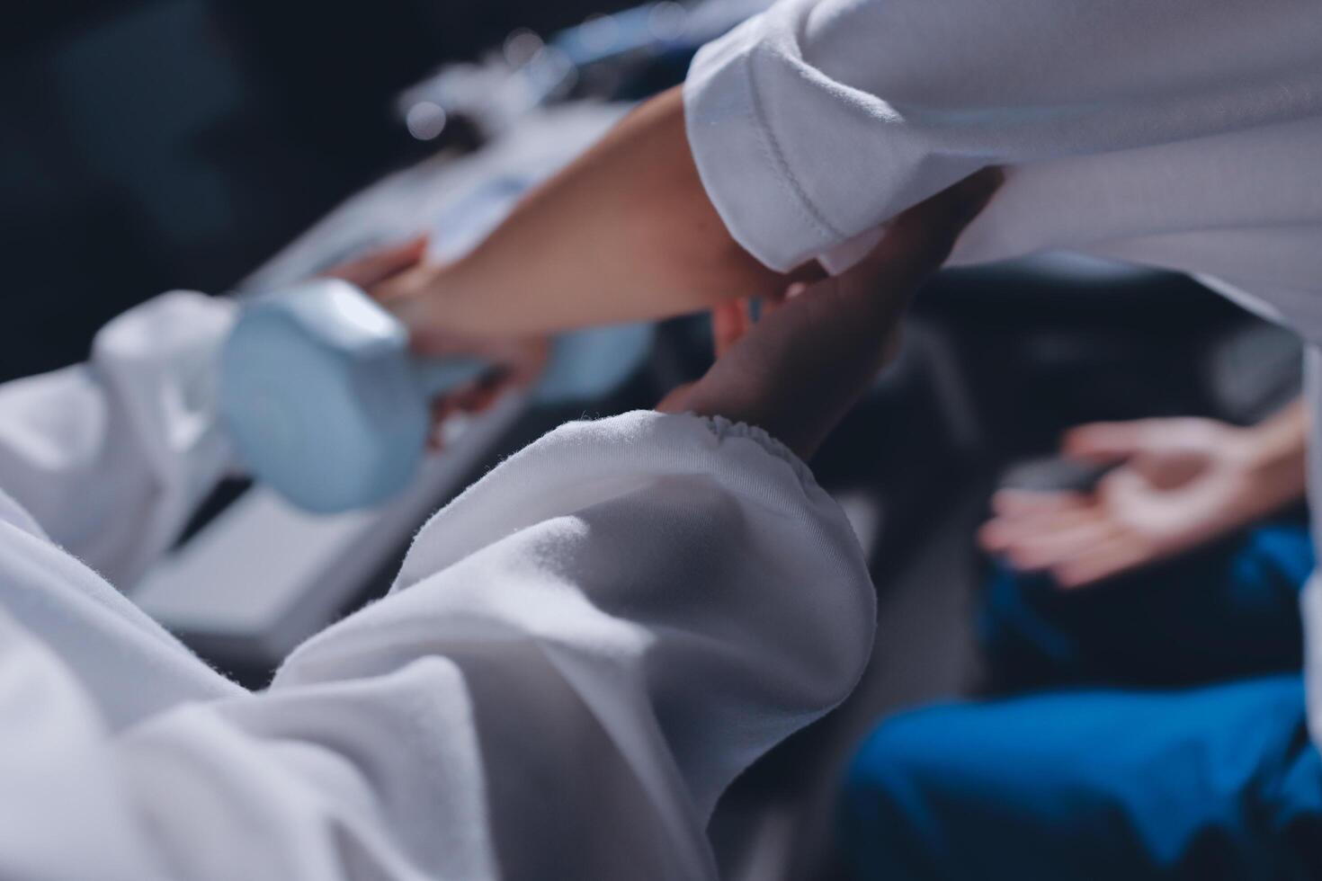 A doctor is holding a white object photo