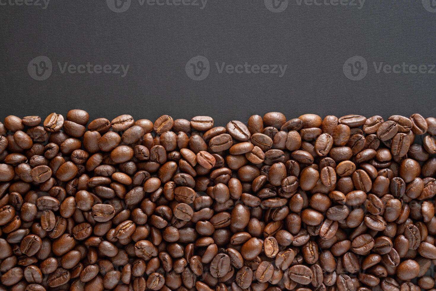 Coffee beans background. Top view coffee beans with copy space area for your text. photo