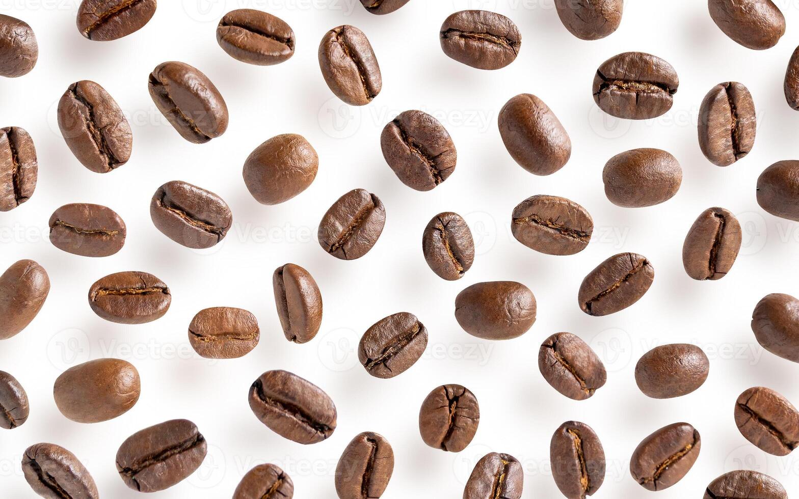 Roasted coffee beans. Scattered coffee beans on a white background with clipping path. photo