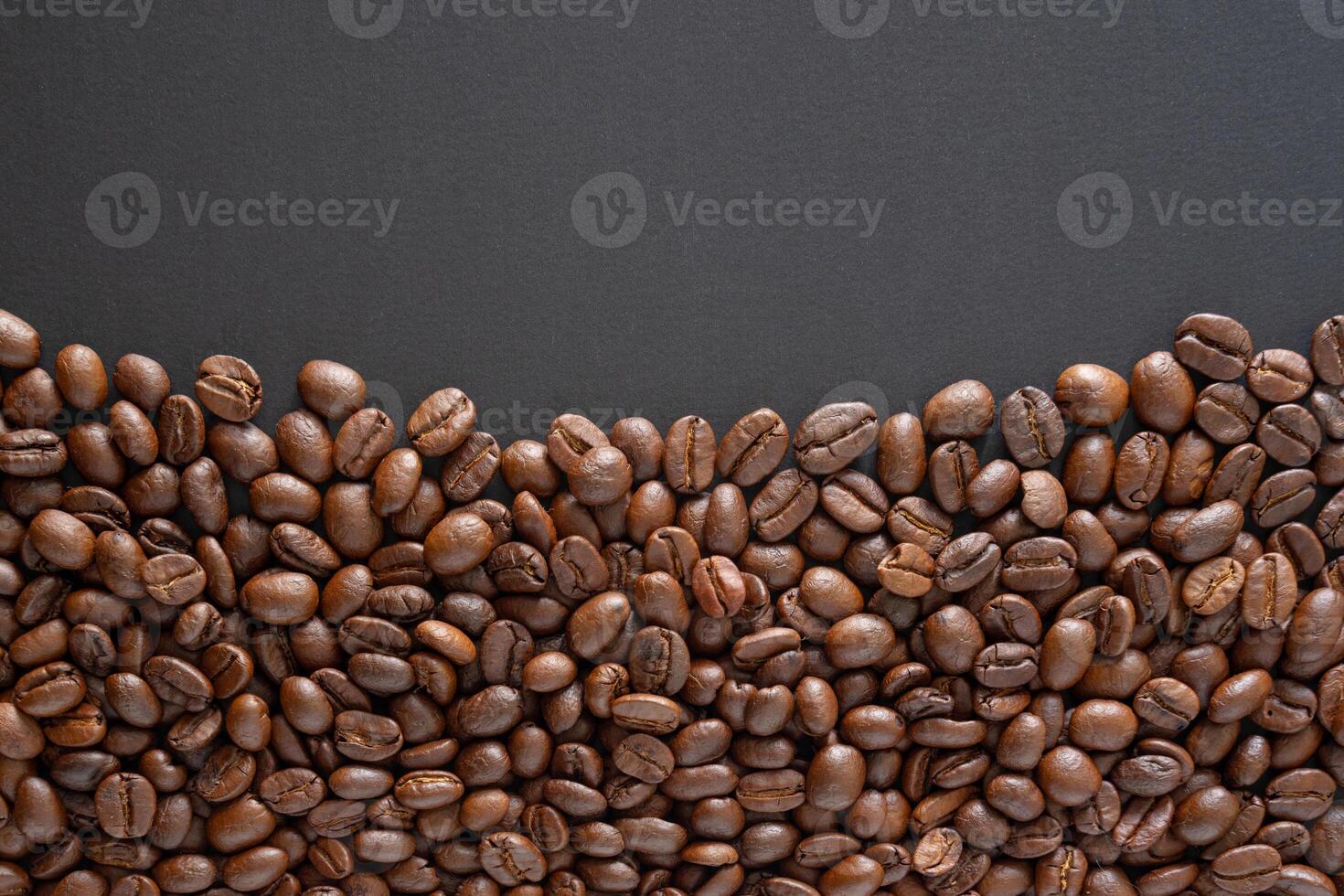 Coffee beans background. Top view coffee beans with copy space area for your text. Close up images. photo