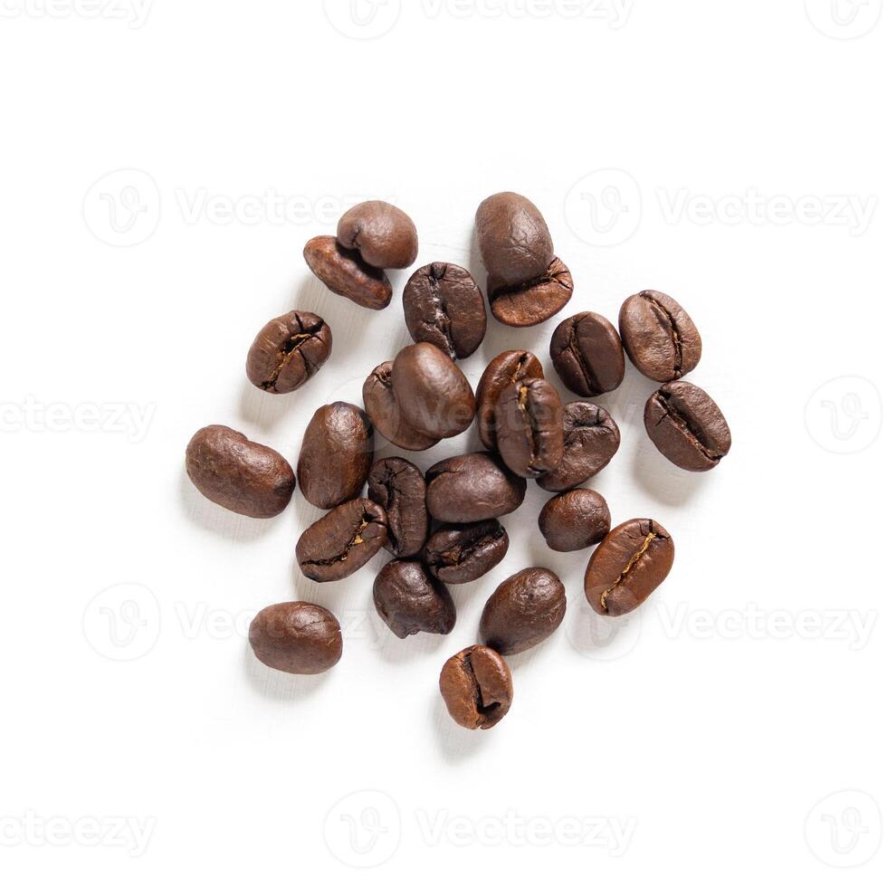 Coffee beans seeds on white background. Close up image. photo
