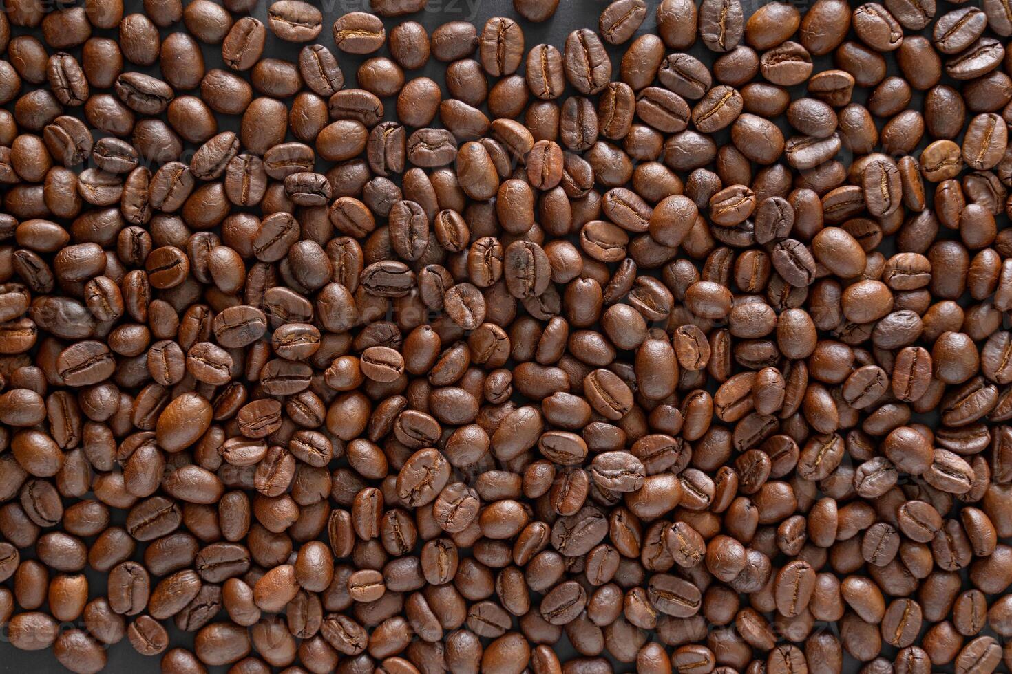 Coffee beans background. Top view coffee beans with copy space area for your text. Close up image. photo