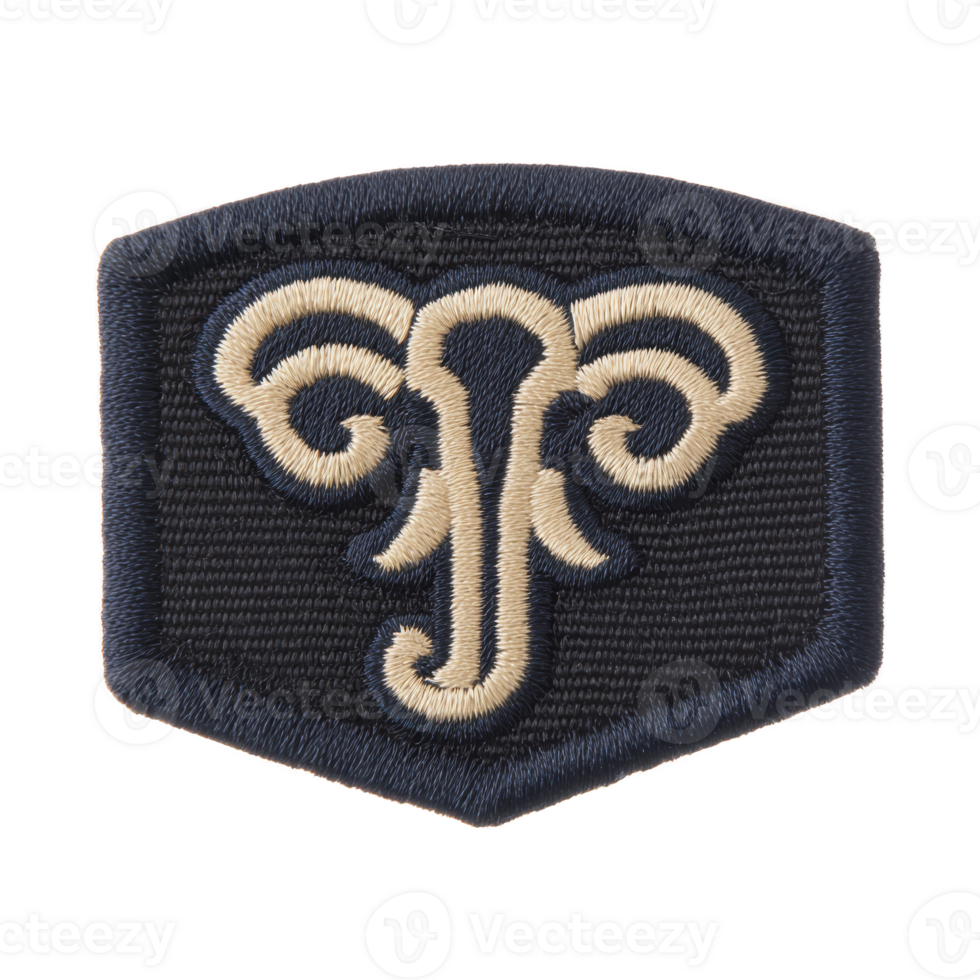 This features embroidered patch with stylized ram head design, showcasing intricate stitching in beige and navy blue. patch has shield like shape, giving it bold and distinctive appearance png