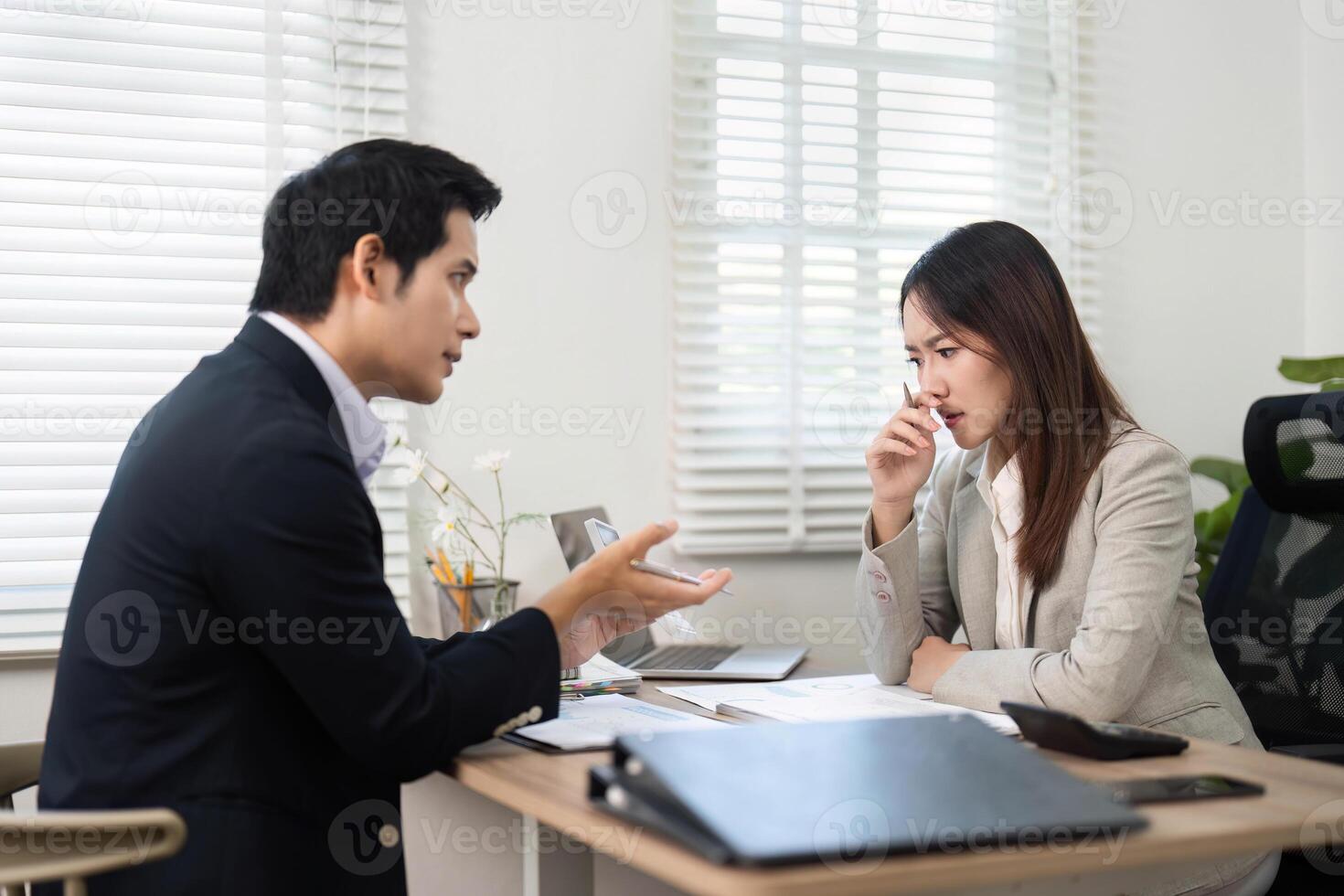 Financial Consultation. Professional discussion between a financial advisor and a client in an office. photo