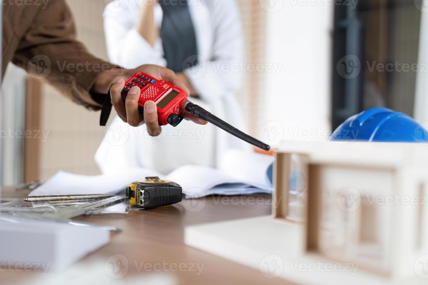 ESG in Construction. Professional using communication tools for project management. photo
