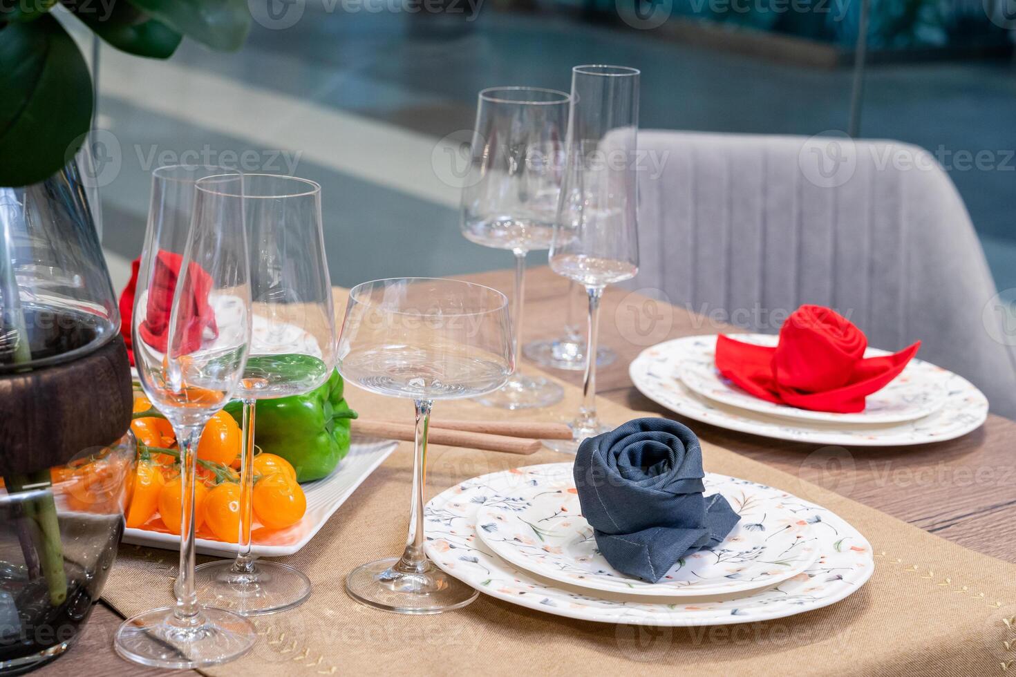 Elegant Table Setting with Folded Napkins and Glassware photo