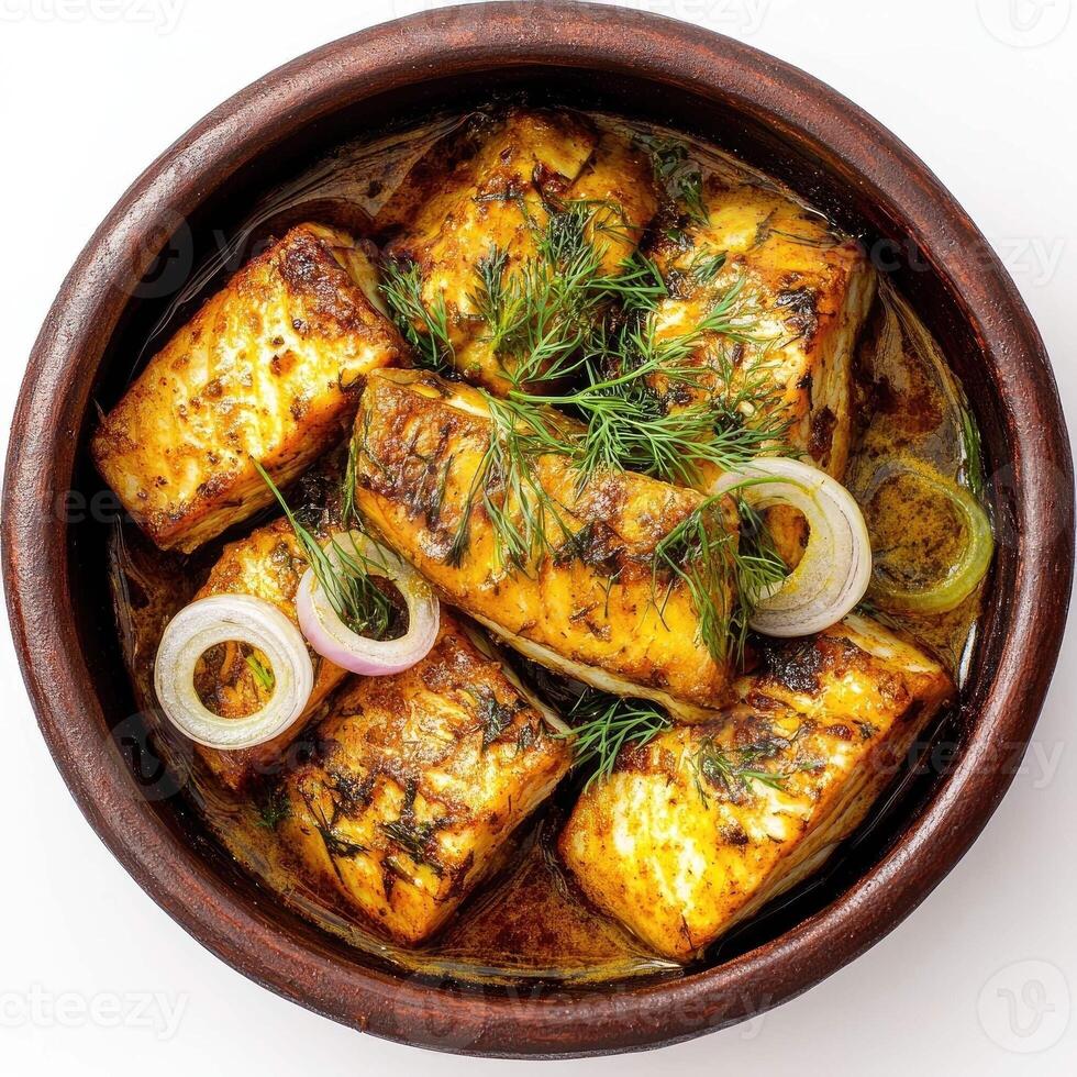 Delicious fish dish served in a rustic earthenware bowl with fresh dill photo