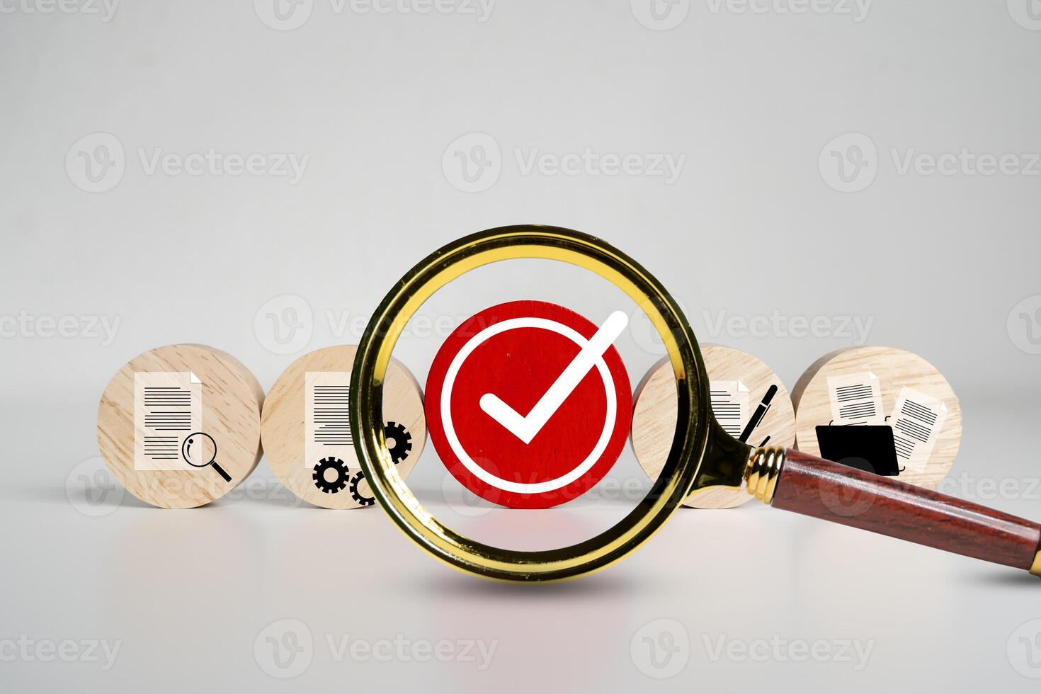 Magnifying Glass Focuses on Red Check Mark with Document Icons, Quality Control and Verification Concept photo