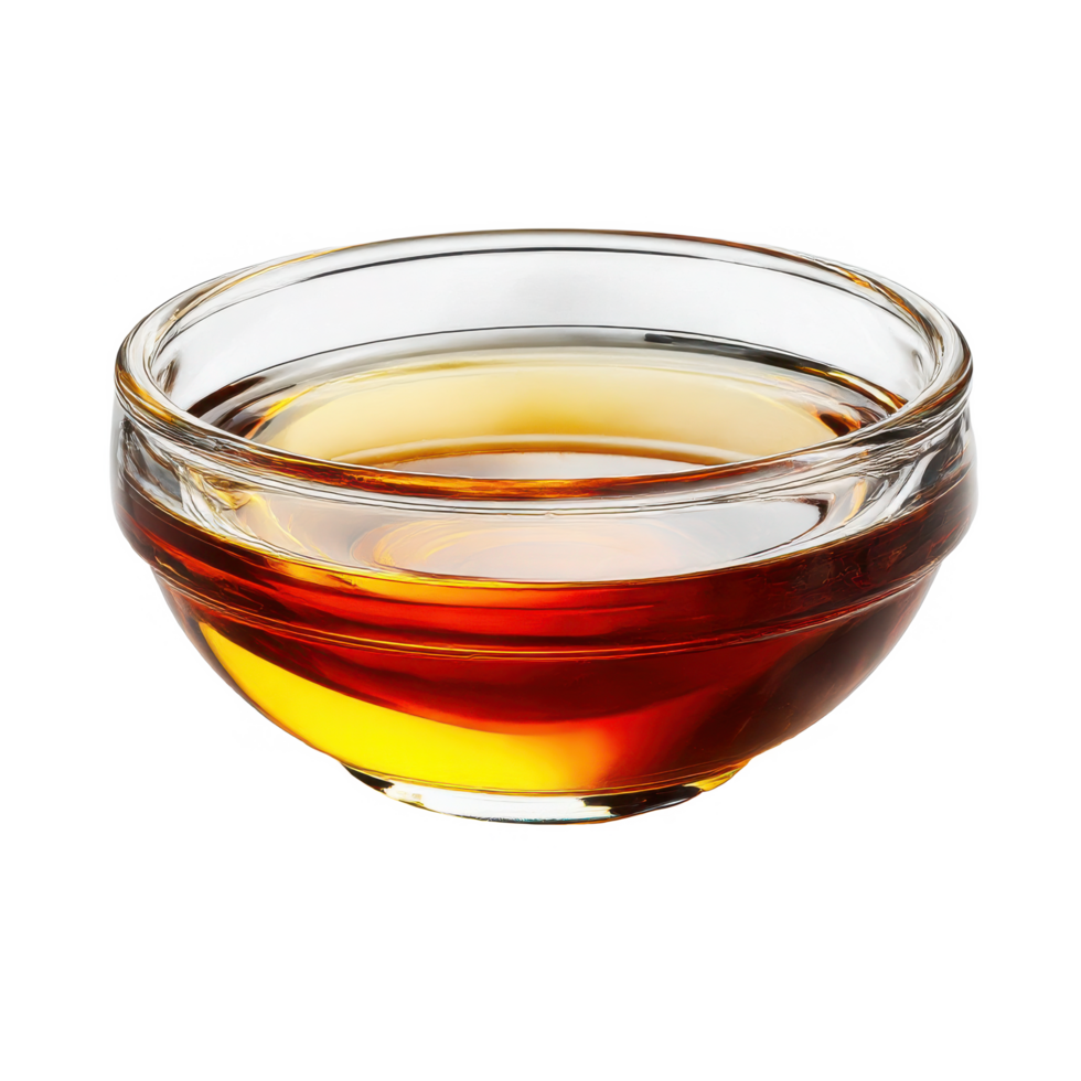 Close up view of a bowl of maple syrup or liquid honey for cooking on transparent background png