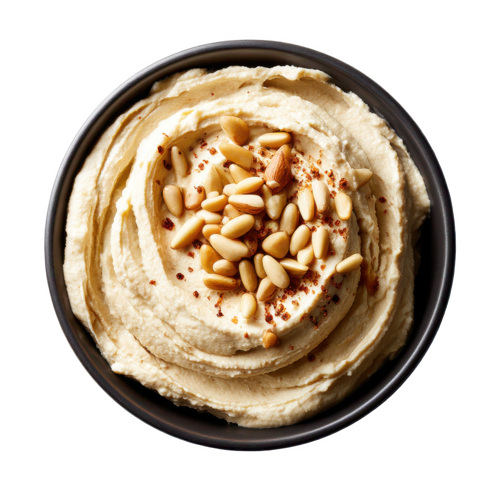 Delicious hummus dip with pine nuts in bowl healthy food concept on transparent background png