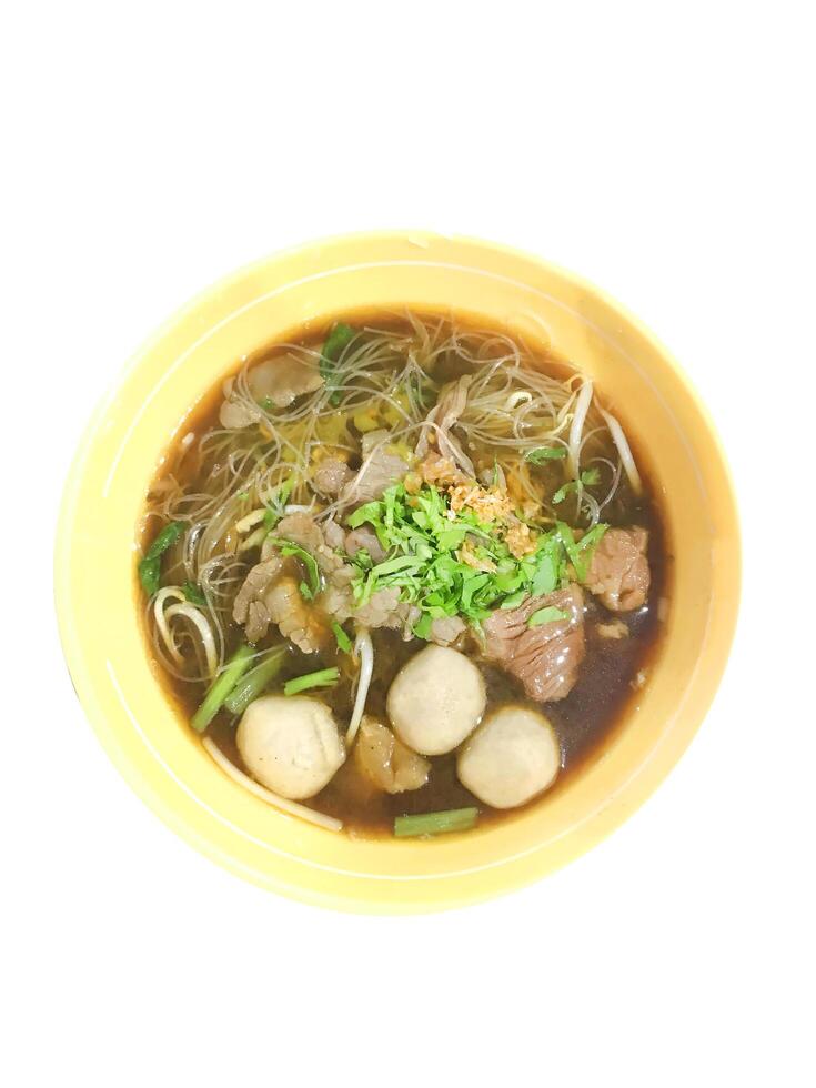 Top view of Stewed beef soup with morning glory, focus selective photo