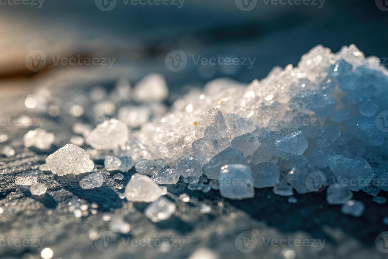Glistening salt crystals are showcased in a close up, creating a textural display. photo