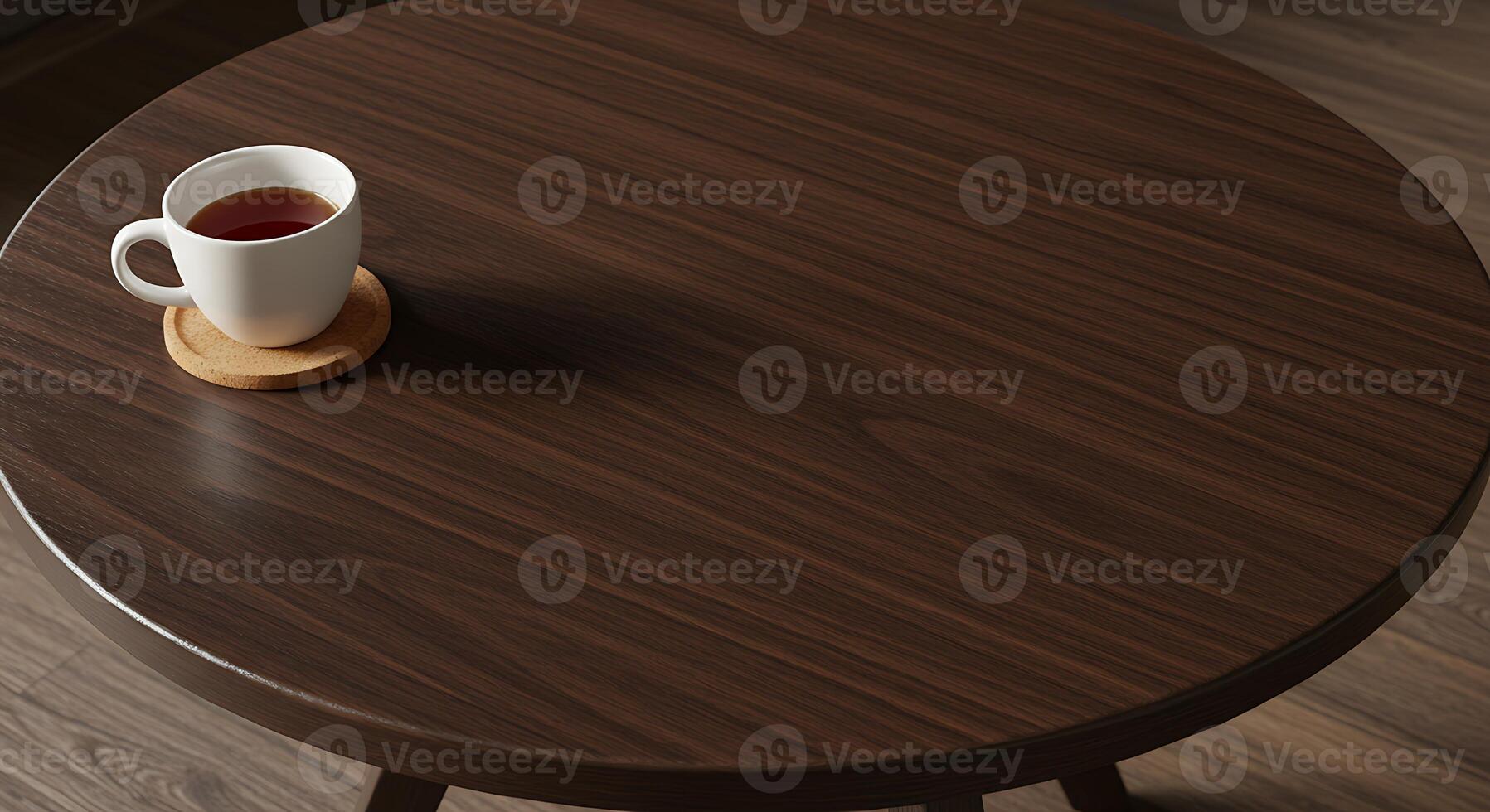 A Cup of Tea on a Dark Wood Table photo