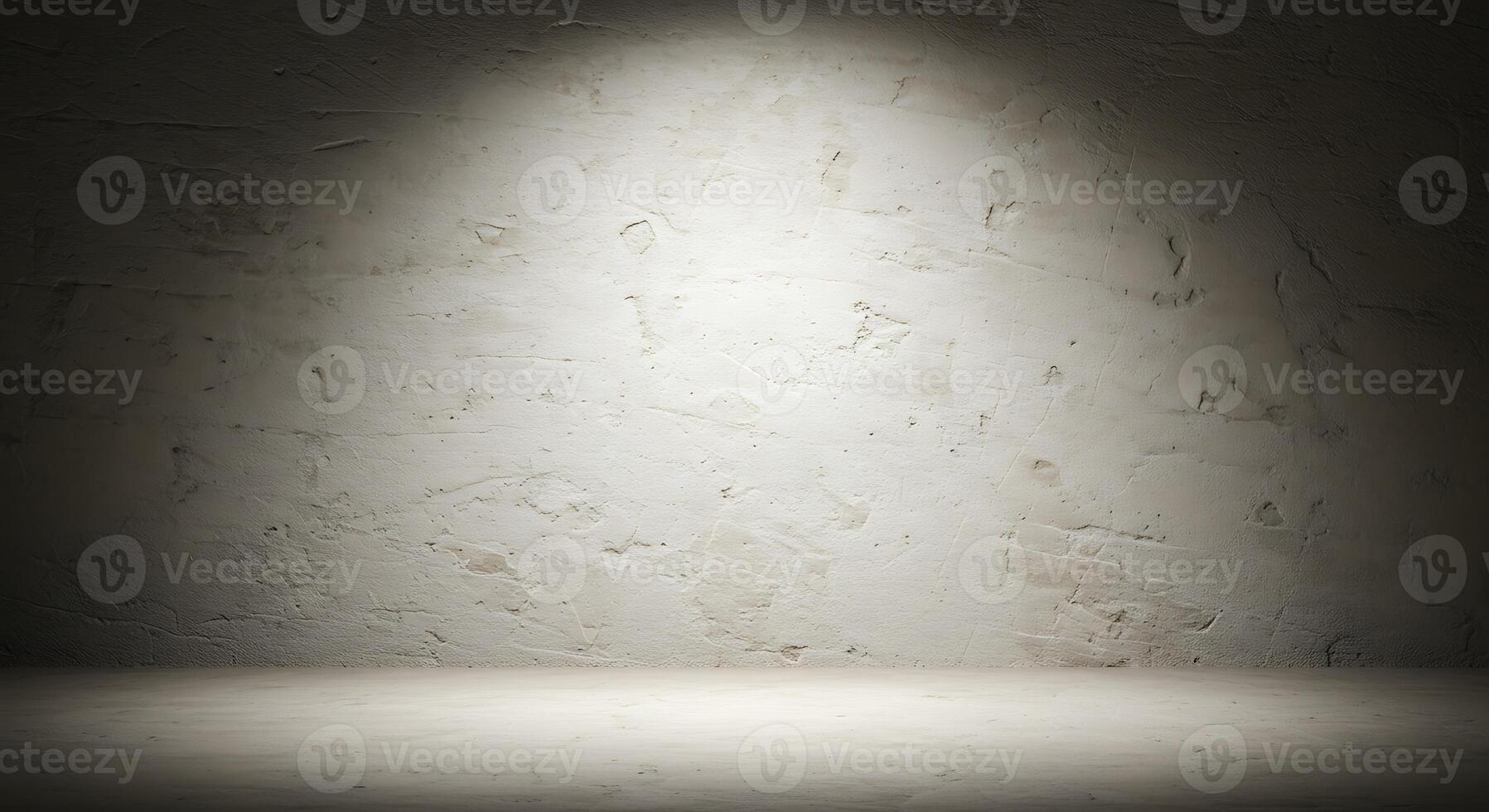 An empty room with a light shining on it photo