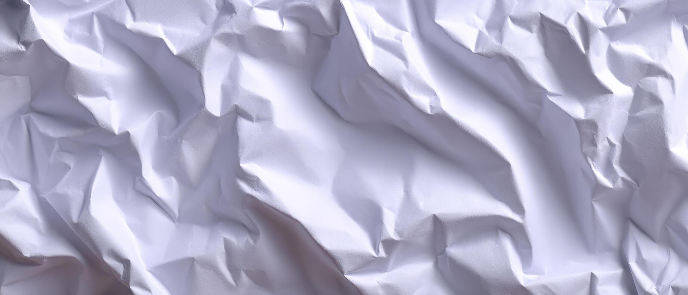 Crumpled white paper close-up texture studio setting abstract photography soft lighting photo