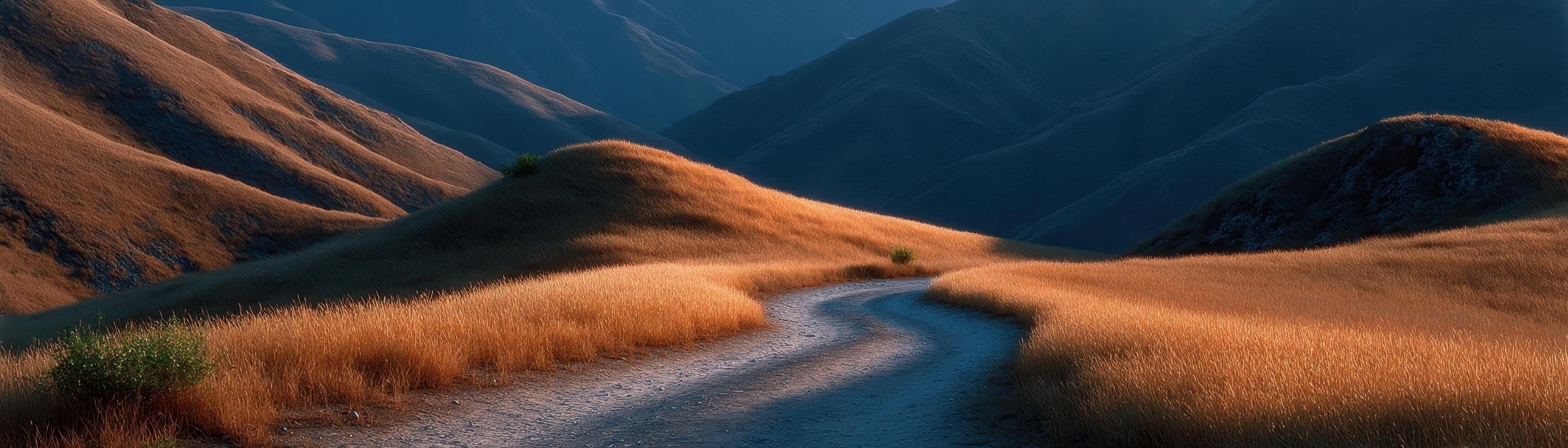 Golden hour shadows on curved hills scenic landscape nature photography tranquil environment photo