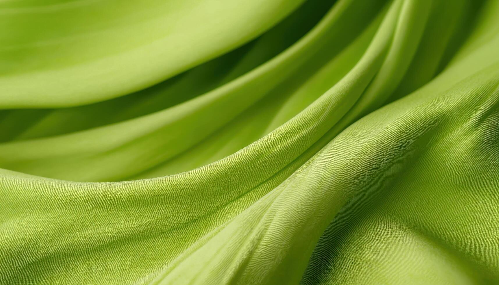 Closeup of green fabric texture studio image detail soft lighting macro view textile concepts photo