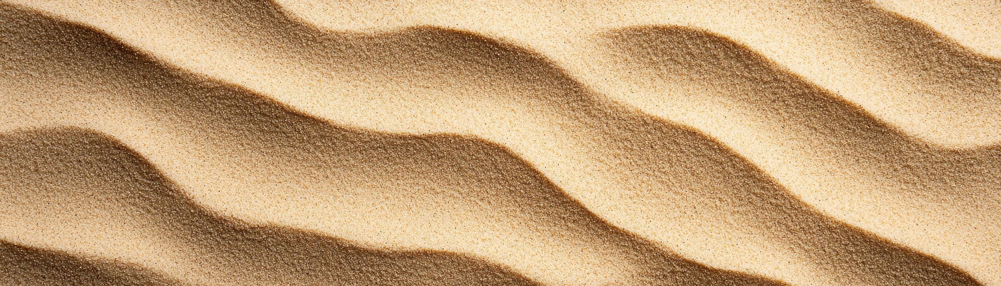 Fine sand texture with shadows from sunlight desert landscape nature photography warm environment photo