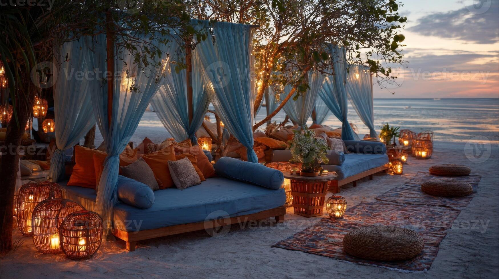 Romantic Beach Sunset with Canopy Beds and Warm Lighting photo