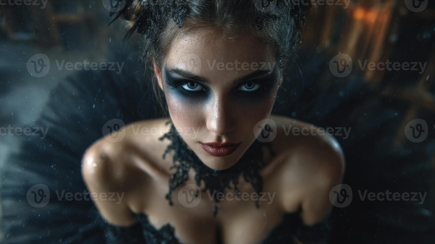 Black Swan Inspired Portrait Woman in Black Tulle Dress with Dark Makeup photo