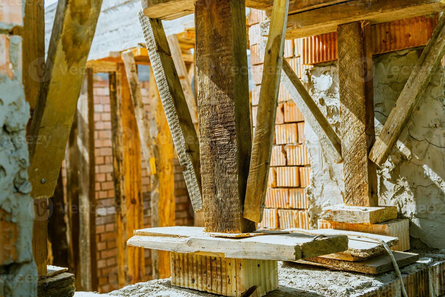 A close up of a wooden post in a construction area photo