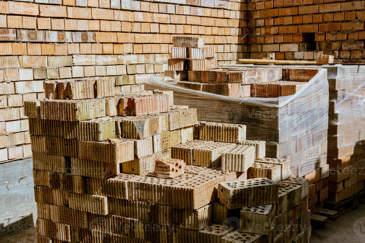 A pile of bricks in a warehouse photo