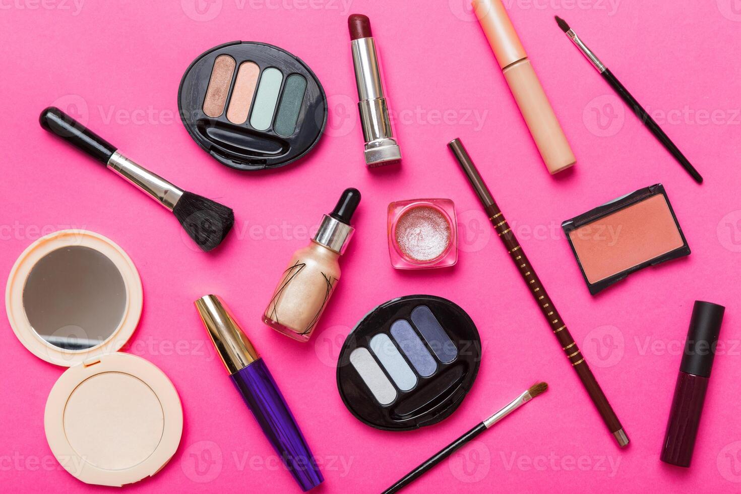 Professional makeup tools. Top view. Beauty, decorative cosmetics. Makeup brushes set and color eyeshadow palette on table background. Minimalistic style photo