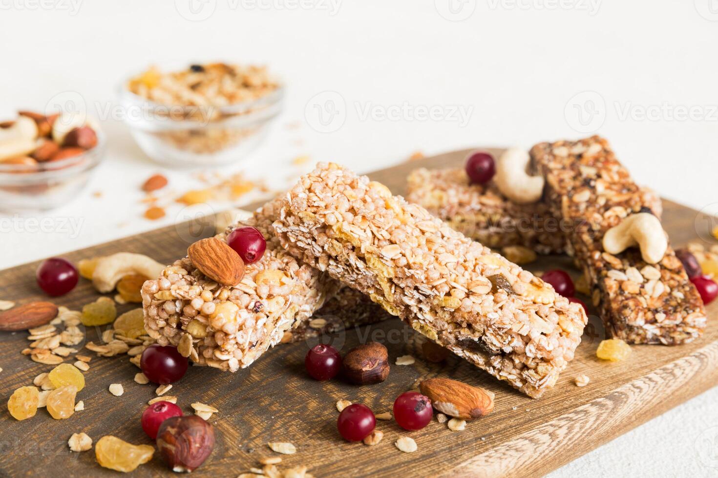Various granola bars table background. Cereal granola bars. Superfood breakfast bars with oats, nuts photo