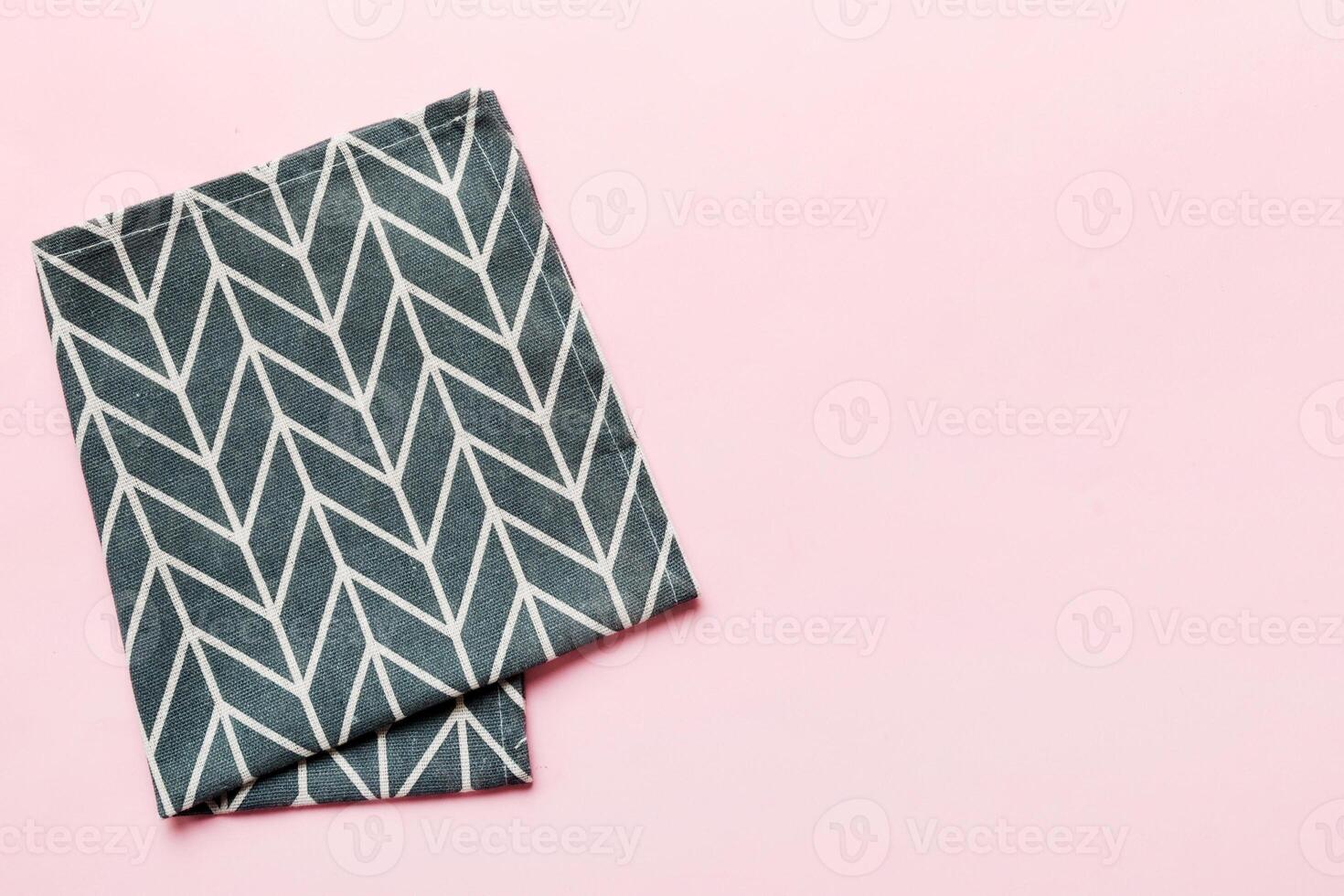 top view blue kitchen napkin isolated table background. Folded cloth for mockup with copy space, photo