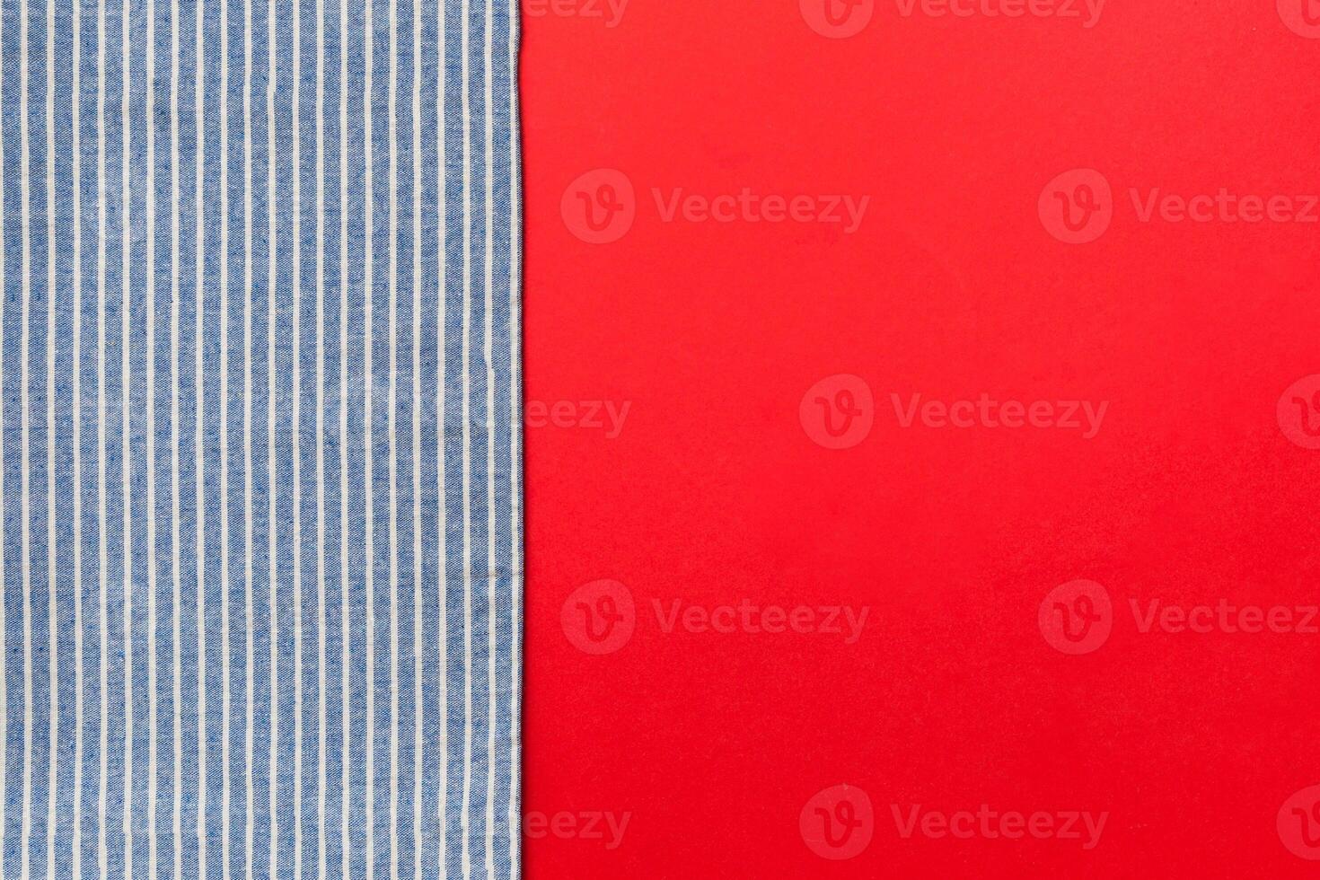 top view blue kitchen napkin isolated on table background. Folded cloth for mockup with copy space photo
