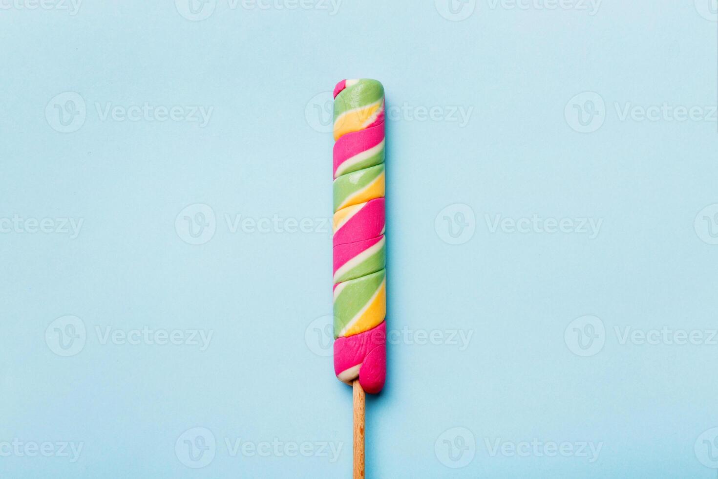 Colorful candies, lollypop on the colorful background, multicolored minimal style photo
