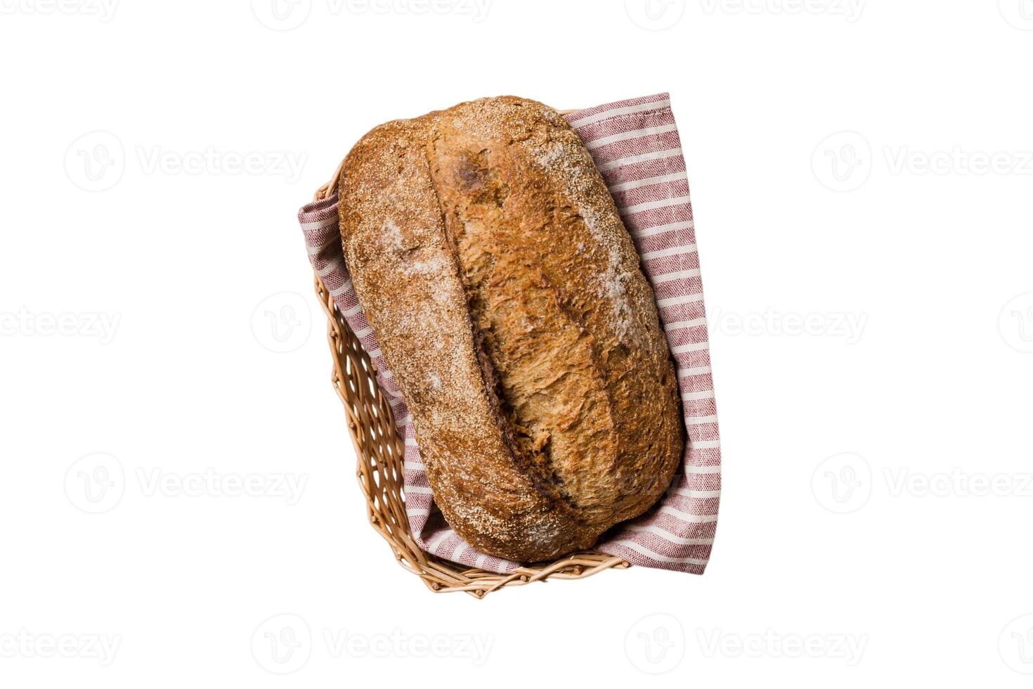 Freshly baked bread on basket isolated on white background. top view bread photo