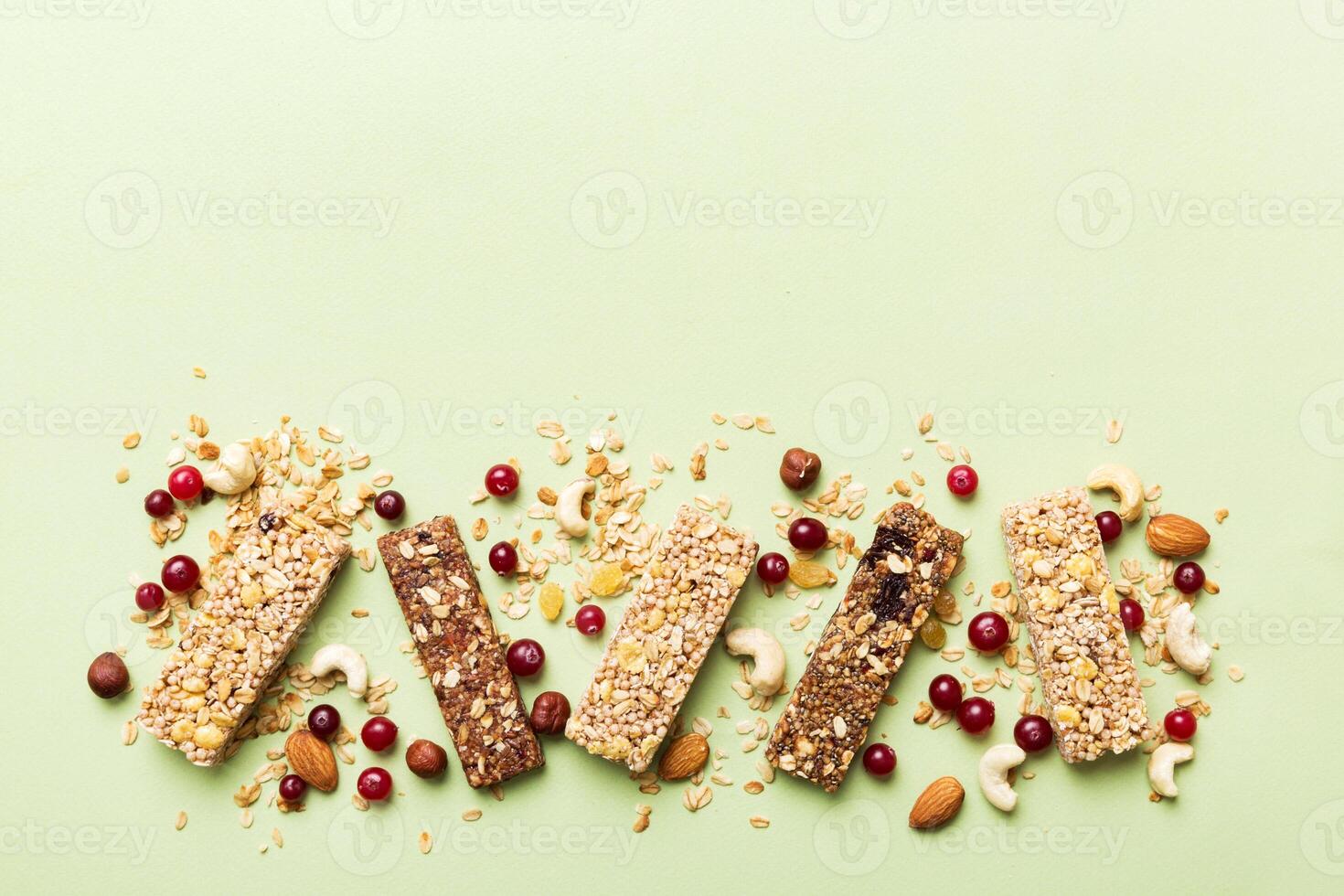 Various granola bars table background. Cereal granola bars. Superfood breakfast bars , nuts and berries. Superfood concept photo